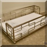 D63. Metal towel holder. 